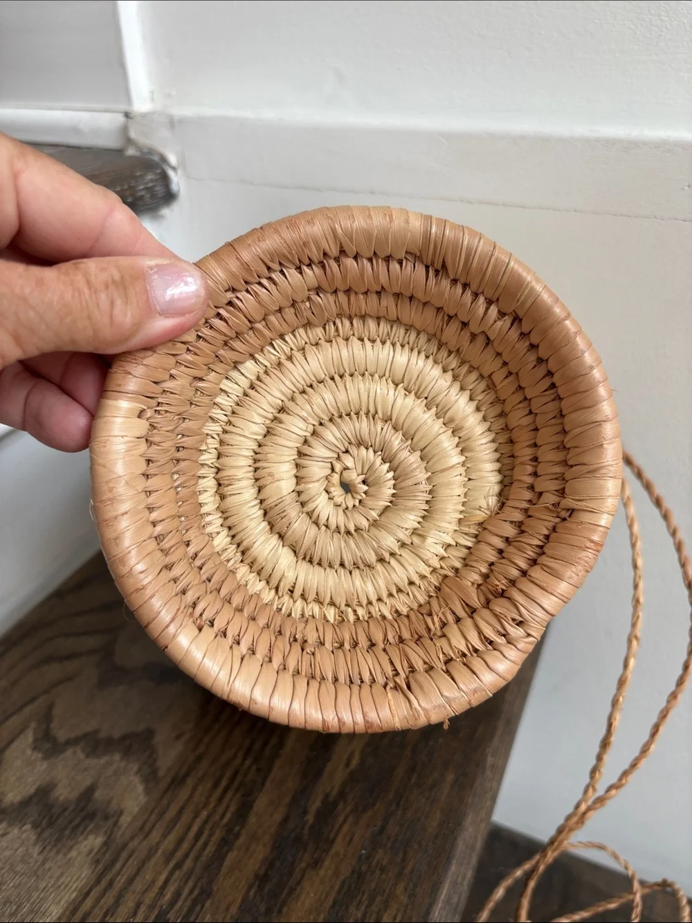 Woven palm leaves? footed basket, purple stripe on rim, 7.5” tall